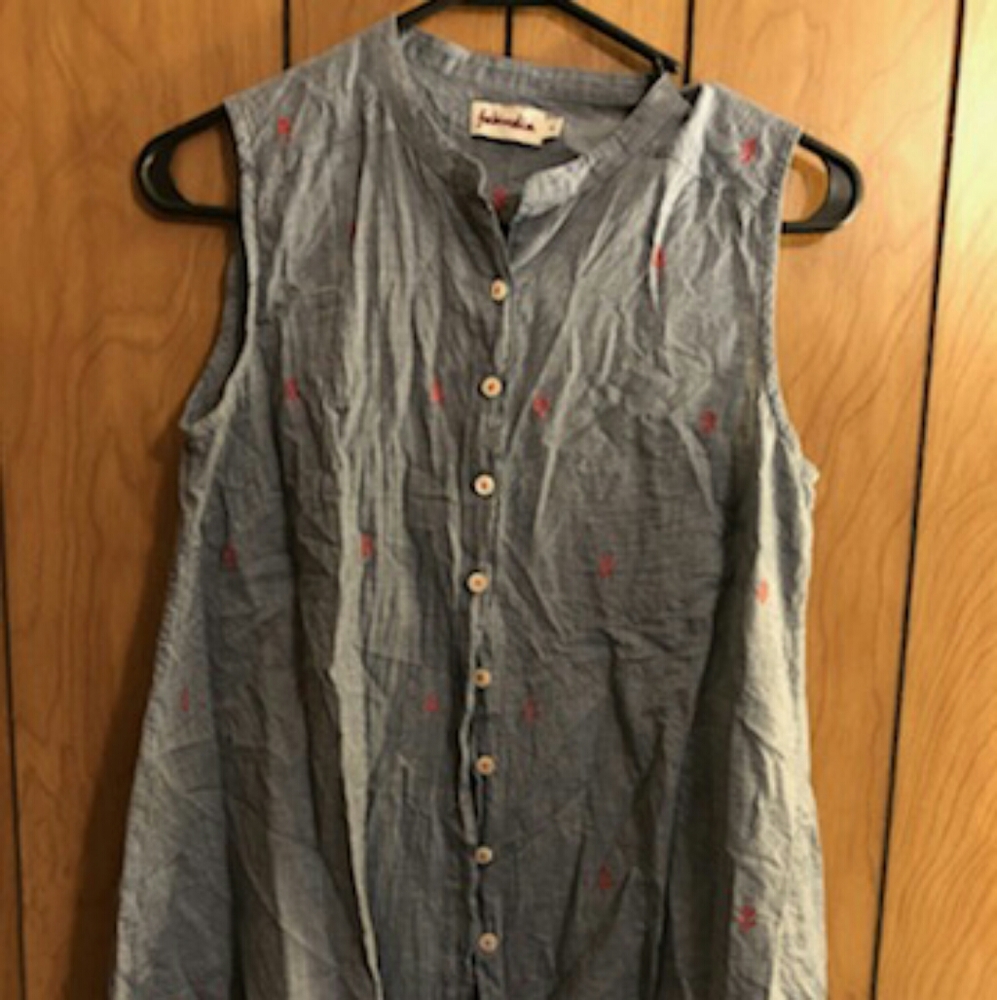 Sleeveless button down shirt